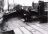 Leeuwarden: de Almeri in 1957, wachtend op de sloop, aan de Willemskade ZZ met uitzicht op de woningen aan de Westersingel bij de Verlaatsbrug.